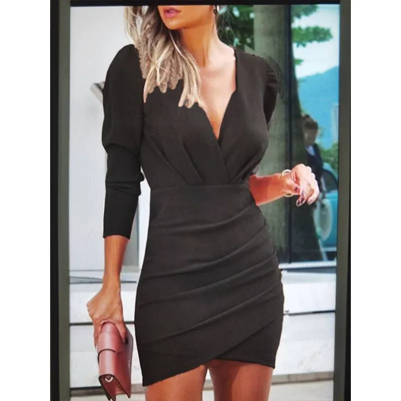 Autumn and winter waist was thinner solid color V-neck long-sleeved tight skirt dress women