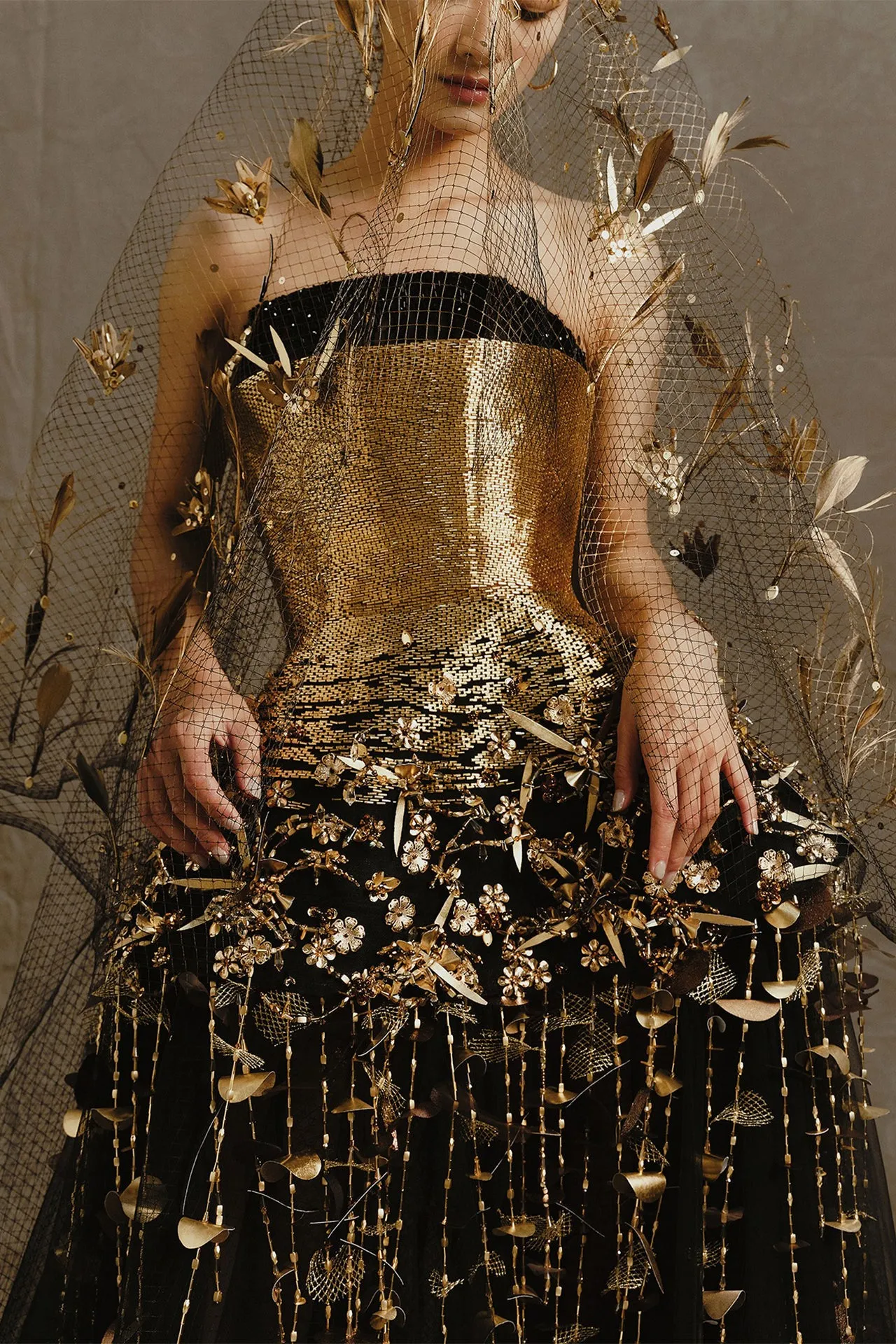 Black Gown with Fitted Gold Bodice and Layered Skirt