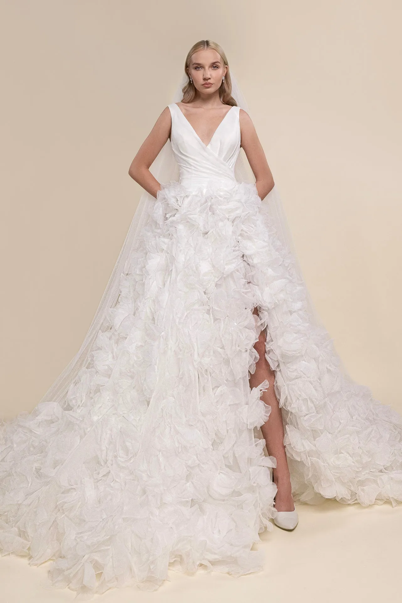 Bridal Gown with V-Neckline, Layered Skirt, Side Slit, and Cathedral-Length Veil
