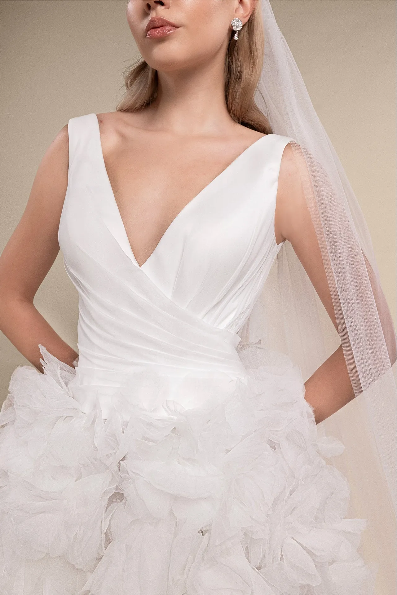 Bridal Gown with V-Neckline, Layered Skirt, Side Slit, and Cathedral-Length Veil