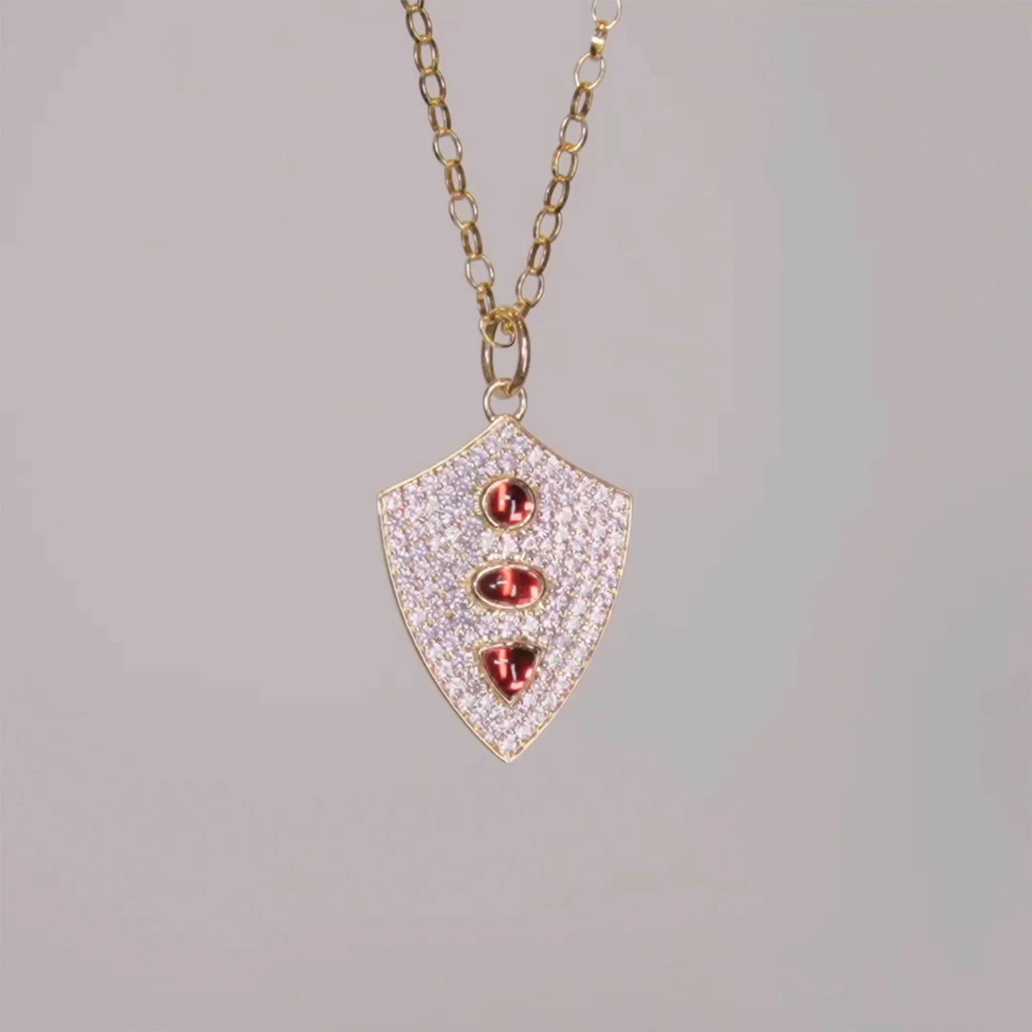Fearless Shield with Pave Pink Sapphires and Rhodolite